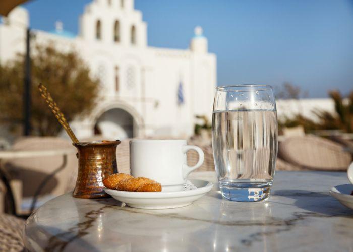 greek coffee and biscuit Snatorines shutterstock