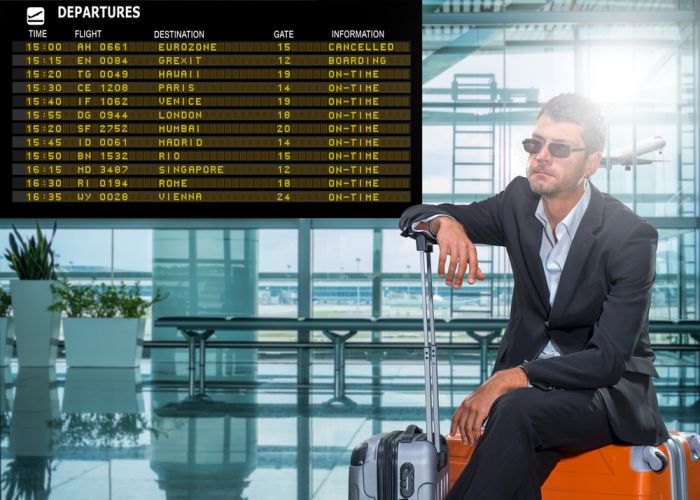 man in airport Netfalls Remy Musser shutterstock