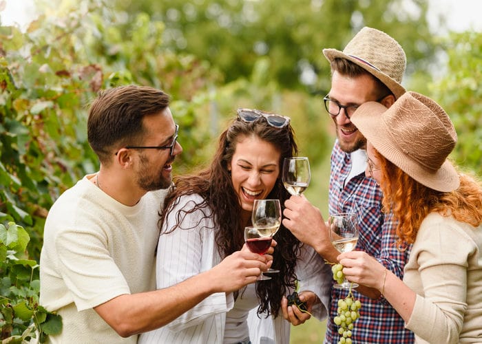 friends in italian vineyard