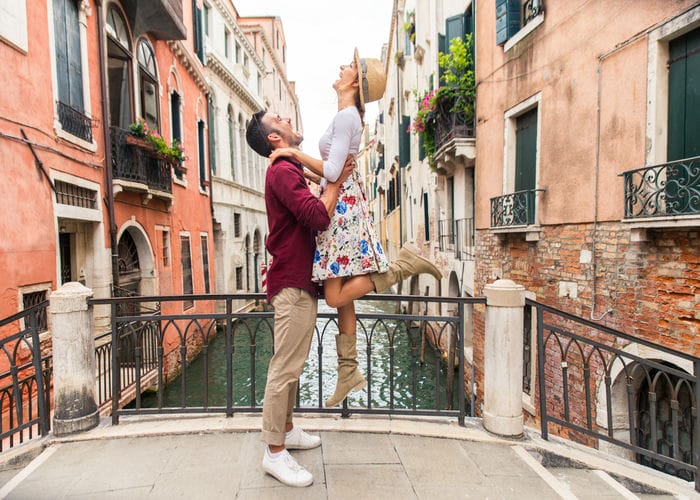 couple in venice canal