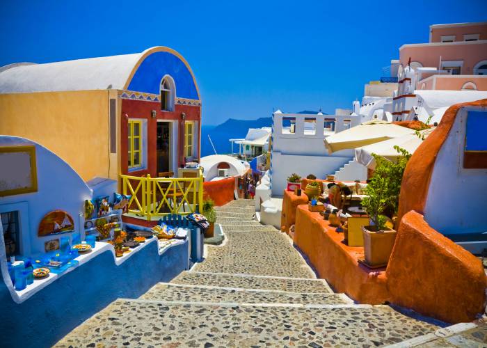 colorful street in oia santorini Anilah shutterstock