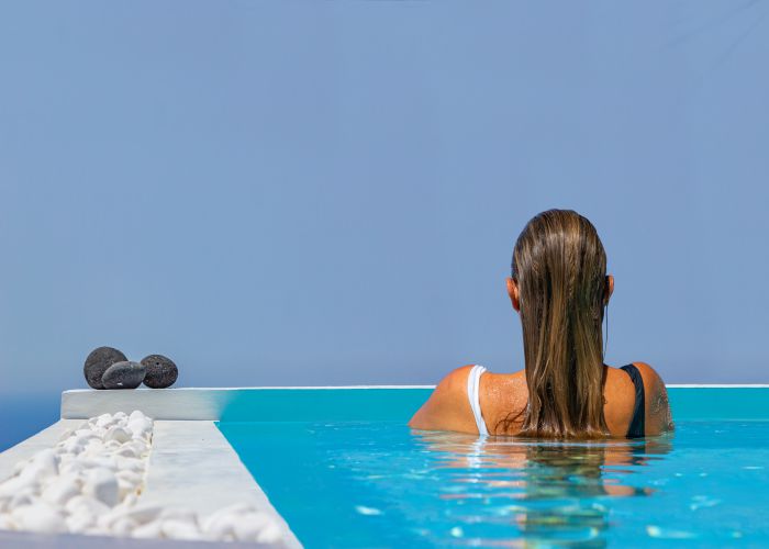 santorini swimming pool Netfalls Remy Musser shutterstock